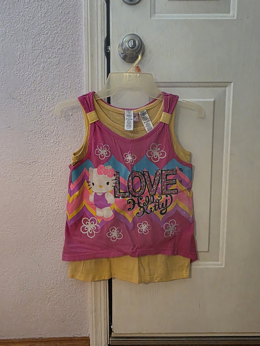 NWOT Hello Kitty Size 10-12  Pink & Yellow Layered Tank Top with Chevron Graphic